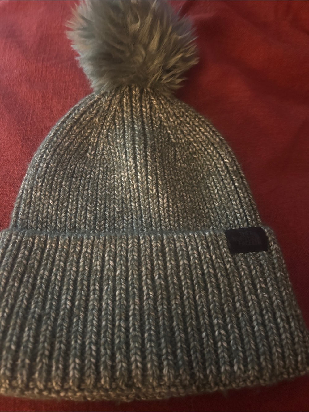 The North Face Heathered Olive Knit Beanie with Faux Fur Pom